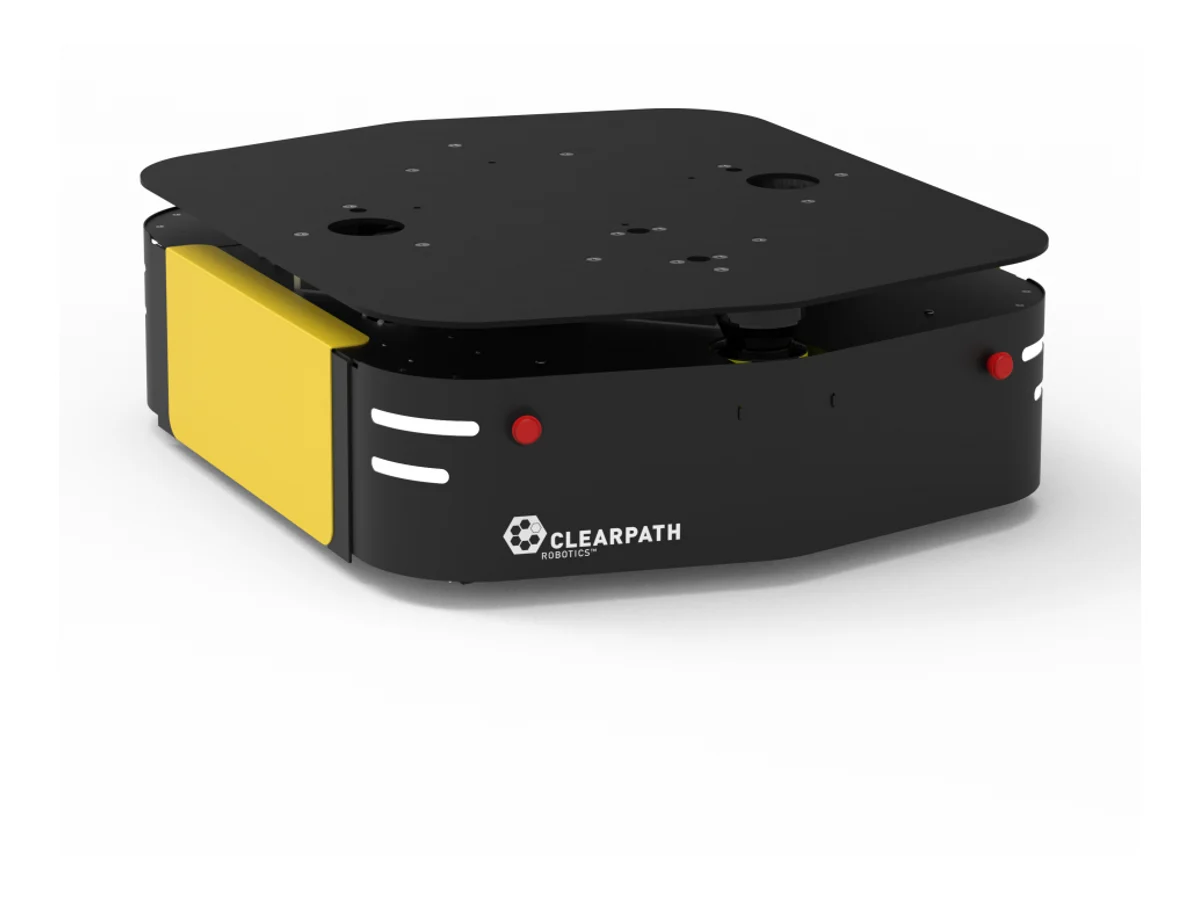 The Clearpath Ridgeback: a low, flat black mobile base with a yellow side panel and a large flat mounting deck on top.